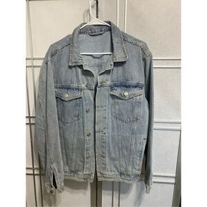 Denim jacket size L-XL with graphic print on the back